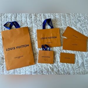 Louis Vuitton Orange Bag with Blue Handles